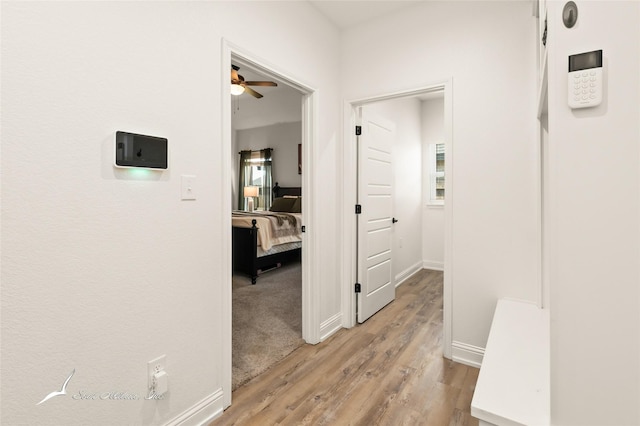 7010 Jet Stream Dr, Abilene, TX 79606 - hall featuring light wood-style flooring and baseboards