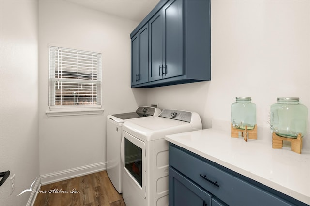 7010 Jet Stream Dr, Abilene, TX 79606 - laundry area with cabinet space, separate washer and dryer, dark wood finished floors, and baseboards