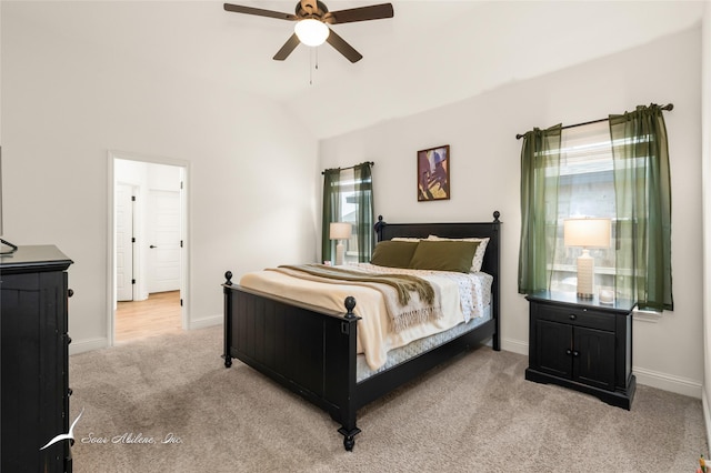 7010 Jet Stream Dr, Abilene, TX 79606 - bedroom with light carpet, baseboards, vaulted ceiling, and a ceiling fan
