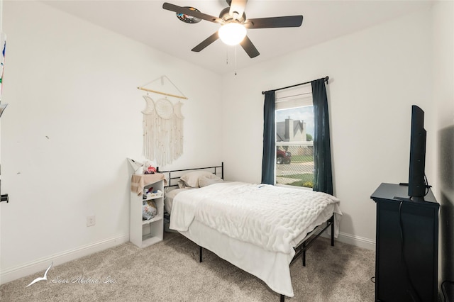 7010 Jet Stream Dr, Abilene, TX 79606 - carpeted bedroom with baseboards and ceiling fan