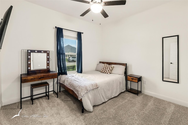 7010 Jet Stream Dr, Abilene, TX 79606 - bedroom with carpet floors, baseboards, and a ceiling fan