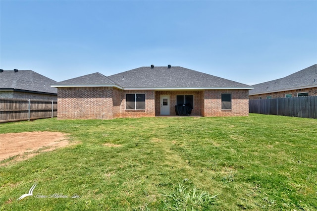 7010 Jet Stream Dr, Abilene, TX 79606 - back of property featuring brick siding and roof with shingles