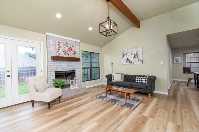 3918 Trinity Dr, Temple, TX 76504 - living room with a chandelier, beam ceiling, wood finished floors, recessed lighting, and baseboards