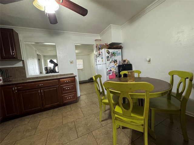 1206 S Crockett Dr, Abilene, TX 79605 - dining room with ceiling fan and ornamental molding