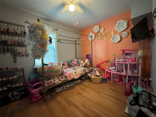 1206 S Crockett Dr, Abilene, TX 79605 - bedroom with wood finished floors and a ceiling fan