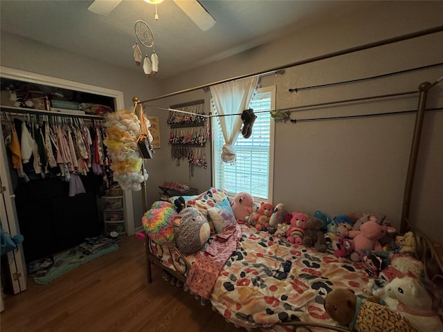 1206 S Crockett Dr, Abilene, TX 79605 - bedroom with wood finished floors, a closet, and a ceiling fan