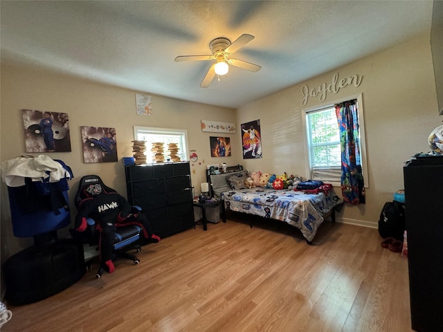 1206 S Crockett Dr, Abilene, TX 79605 - bedroom with light wood-style floors and a ceiling fan