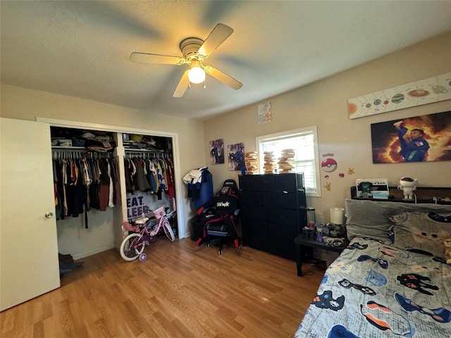 1206 S Crockett Dr, Abilene, TX 79605 - bedroom featuring light wood-style floors, a closet, and ceiling fan