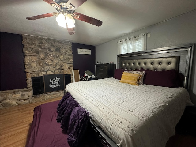 1206 S Crockett Dr, Abilene, TX 79605 - bedroom featuring wood finished floors and a ceiling fan