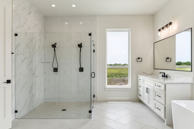 1324 Streetman Rd, Royse City, TX 75189 - full bathroom with a shower stall, vanity, recessed lighting, a freestanding tub, and tile patterned floors