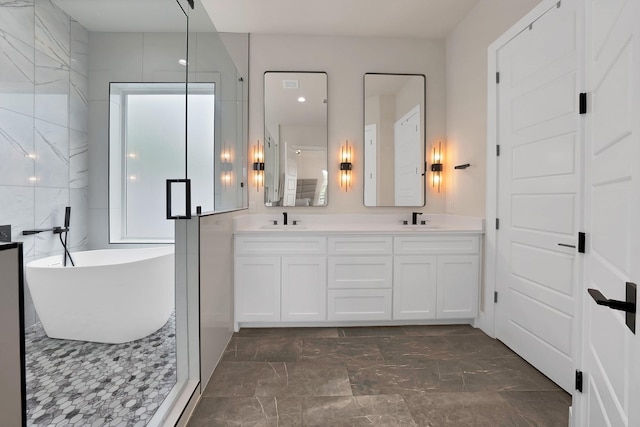 404 Bobbie St, Dallas, TX 75203 - full bathroom with double vanity, a freestanding tub, and a stall shower