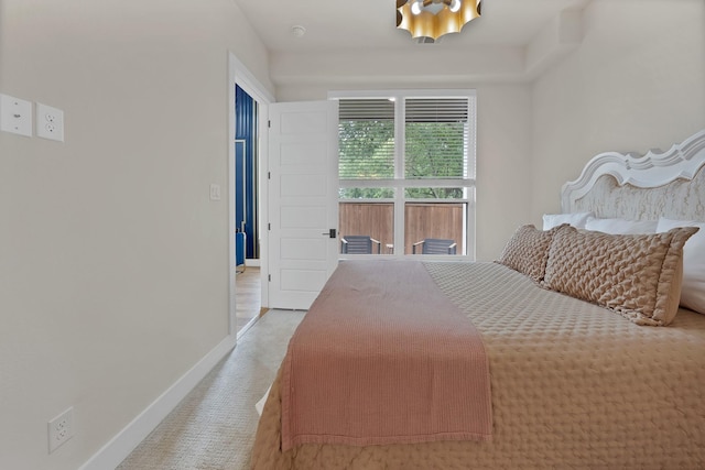 404 Bobbie St, Dallas, TX 75203 - carpeted bedroom featuring baseboards