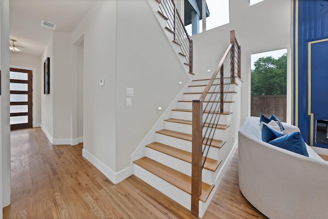 404 Bobbie St, Dallas, TX 75203 - stairs featuring wood finished floors and baseboards