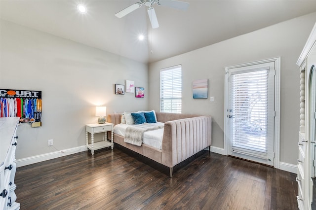 4220 Colton Dr, Carrollton, TX 75010 - bedroom with vaulted ceiling, access to exterior, multiple windows, baseboards, and wood finished floors