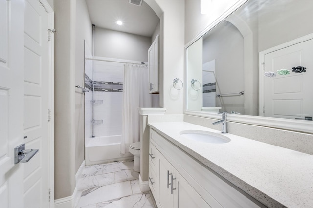 4220 Colton Dr, Carrollton, TX 75010 - bathroom with marble finish flooring, toilet, vanity, baseboards, and shower / bath combo