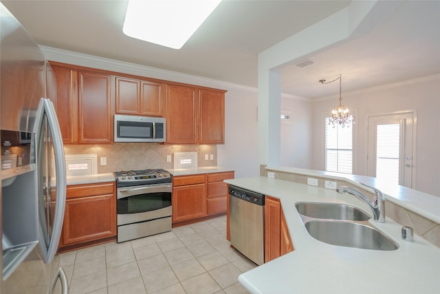 4001 Stone Oak Blvd, Denton, TX 76210 - kitchen featuring appliances with stainless steel finishes, a sink, ornamental molding, light countertops, and decorative backsplash