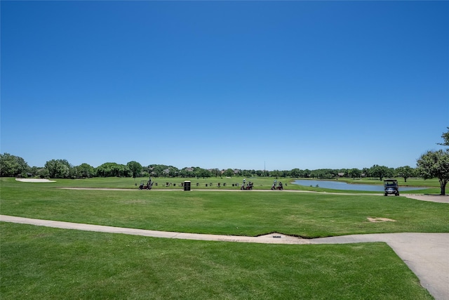 4001 Stone Oak Blvd, Denton, TX 76210 - view of home's community featuring a lawn, a water view, and view of golf course