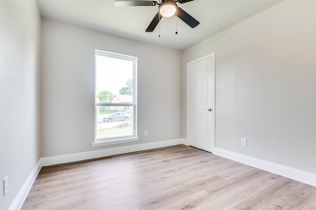 1326 Taperwicke Dr, Dallas, TX 75232 - empty room featuring wood finished floors, baseboards, and ceiling fan
