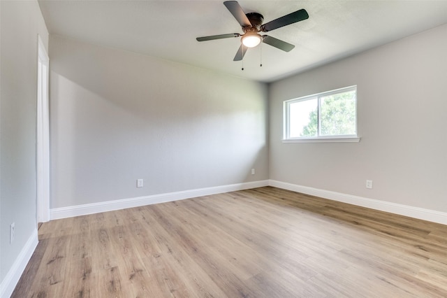 1326 Taperwicke Dr, Dallas, TX 75232 - unfurnished room with light wood finished floors, a ceiling fan, and baseboards