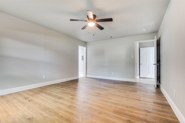 1326 Taperwicke Dr, Dallas, TX 75232 - unfurnished room with ceiling fan, light wood-type flooring, and baseboards