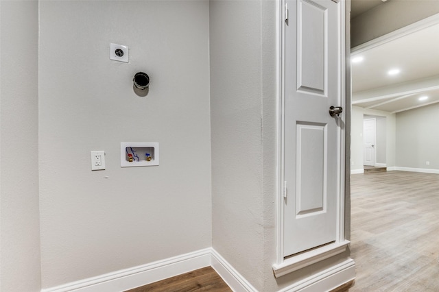 1326 Taperwicke Dr, Dallas, TX 75232 - laundry area featuring hookup for an electric dryer, wood finished floors, washer hookup, and baseboards