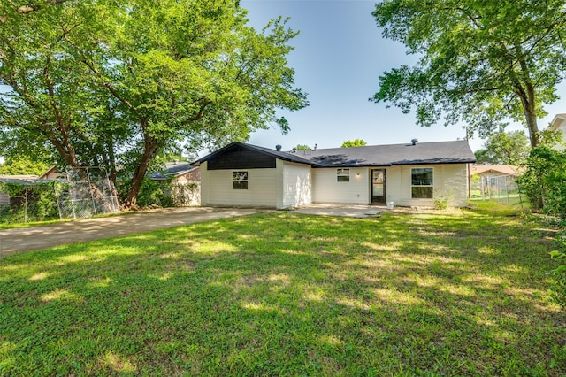 1326 Taperwicke Dr, Dallas, TX 75232 - back of house with a patio