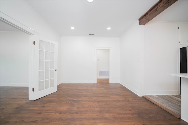 107 W Myrtle, Winnsboro, TX 75494 - unfurnished room with recessed lighting, dark wood-type flooring, and baseboards