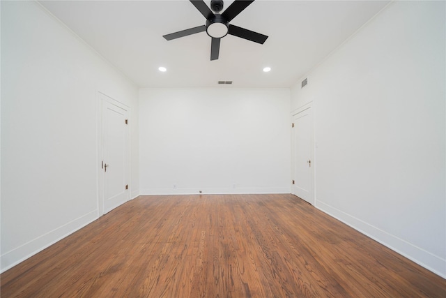 107 W Myrtle, Winnsboro, TX 75494 - unfurnished room with ceiling fan, recessed lighting, baseboards, wood finished floors, and ornamental molding