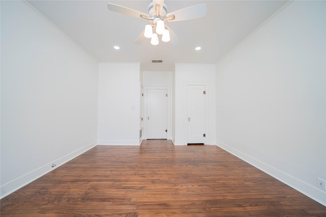 107 W Myrtle, Winnsboro, TX 75494 - spare room with a ceiling fan, recessed lighting, baseboards, dark wood-style flooring, and crown molding
