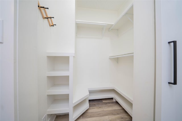 107 W Myrtle, Winnsboro, TX 75494 - walk in closet featuring wood finished floors