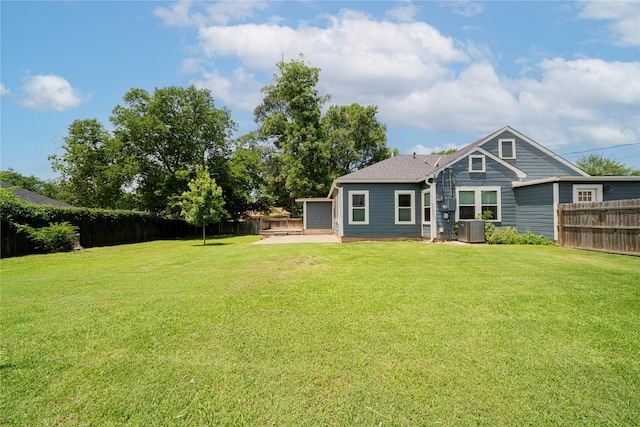 107 W Myrtle, Winnsboro, TX 75494 - rear view of house featuring central AC and a patio