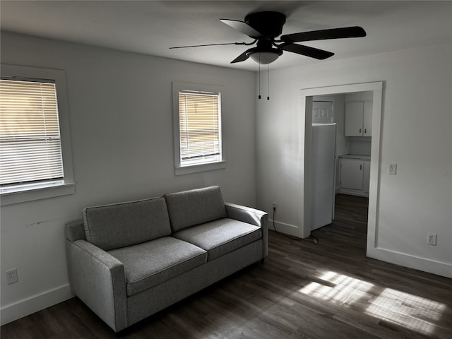2958 Russell Ave, Abilene, TX 79605 - sitting room with ceiling fan, baseboards, and dark wood-style floors