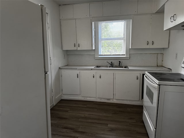 2958 Russell Ave, Abilene, TX 79605 - kitchen featuring white appliances, a sink, light countertops, and dark wood finished floors