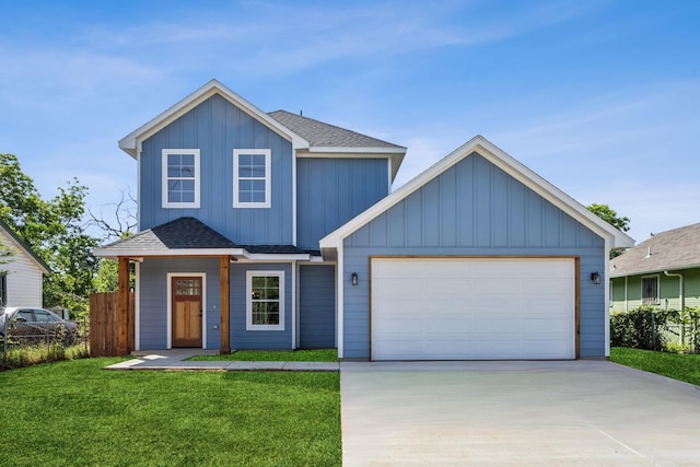 4002 Robert L Parish Sr Ave, Dallas, TX 75210 - view of front of house featuring driveway, a garage, a shingled roof, and board and batten siding