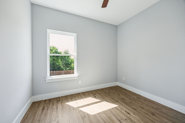 4002 Robert L Parish Sr Ave, Dallas, TX 75210 - unfurnished room with baseboards, wood finished floors, and ceiling fan