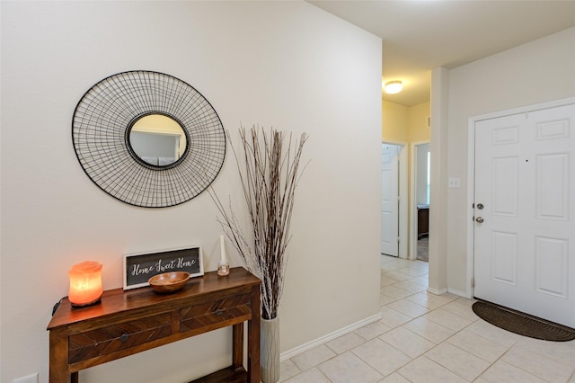 3125 Layla Creek Dr, Little Elm, TX 75068 - entryway with light tile patterned floors and baseboards