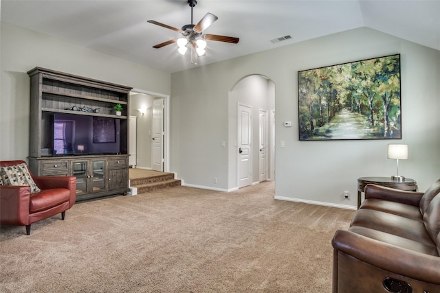 921 Yarwood Way, Burleson, TX 76028 - carpeted living area with a ceiling fan, arched walkways, baseboards, and lofted ceiling