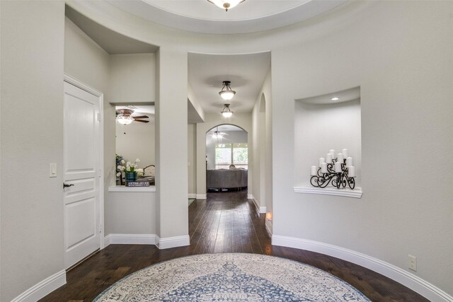 921 Yarwood Way, Burleson, TX 76028 - entrance foyer featuring wood-type flooring, ceiling fan, arched walkways, and baseboards