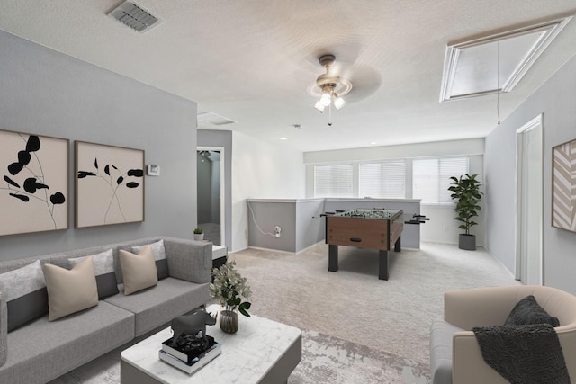 6826 Dream Dust Dr, North Richland Hills, TX 76180 - carpeted living area with attic access and a ceiling fan
