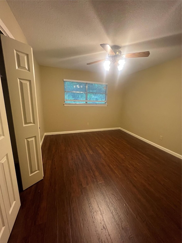 332 Belmont St, Hurst, TX 76053 - unfurnished room featuring ceiling fan, a textured ceiling, dark wood-type flooring, and baseboards