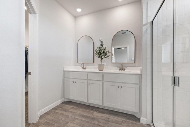 140 Orchard Pines Pl, Boyd, TX 76023 - full bath with a stall shower, wood finished floors, double vanity, recessed lighting, and baseboards