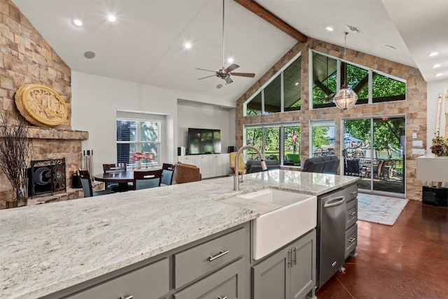 124 Robin Hood Way, Gun Barrel City, TX 75156 - kitchen with a sink, open floor plan, gray cabinetry, high vaulted ceiling, and light stone countertops