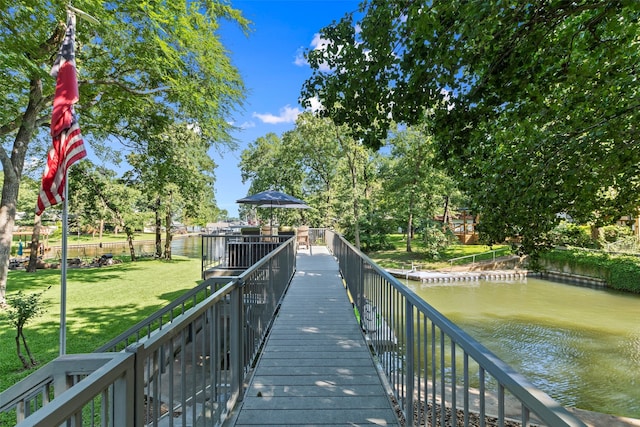 124 Robin Hood Way, Gun Barrel City, TX 75156 - dock area with a water view and a lawn