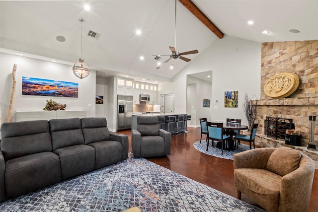 124 Robin Hood Way, Gun Barrel City, TX 75156 - living area featuring high vaulted ceiling, a ceiling fan, a fireplace, beamed ceiling, and recessed lighting