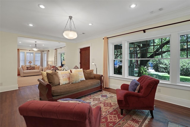211 N Waddill St, Mckinney, TX 75069 - living room with healthy amount of natural light, baseboards, ornamental molding, recessed lighting, and wood finished floors