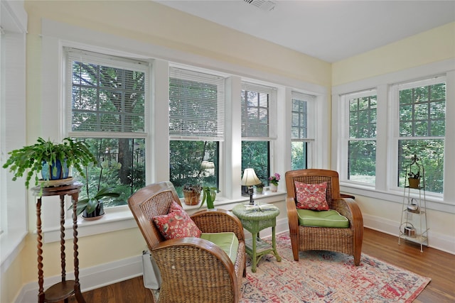 211 N Waddill St, Mckinney, TX 75069 - sunroom featuring healthy amount of natural light, wood finished floors, and baseboards