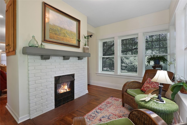 211 N Waddill St, Mckinney, TX 75069 - living room with wood finished floors, a fireplace, baseboards, and plenty of natural light