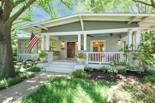 211 N Waddill St, Mckinney, TX 75069 - view of front facade featuring brick siding, a porch, and a ceiling fan