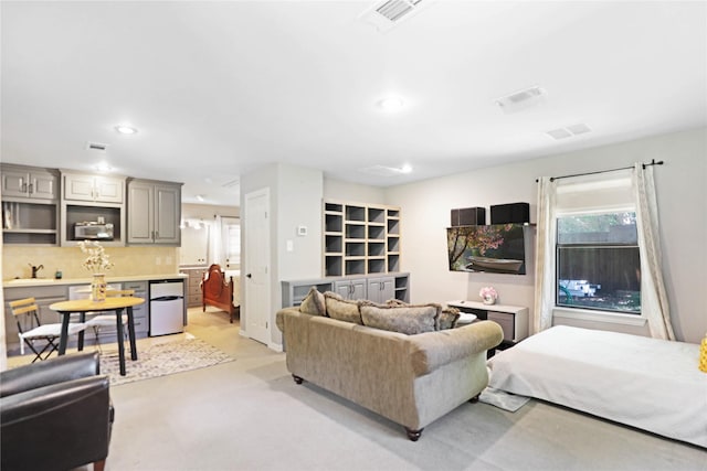 211 N Waddill St, Mckinney, TX 75069 - living room with recessed lighting, healthy amount of natural light, and light carpet