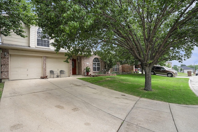 10216 Scurry Ct, Fort Worth, TX 76108 - view of front of property featuring brick siding, an attached garage, a front lawn, and concrete driveway